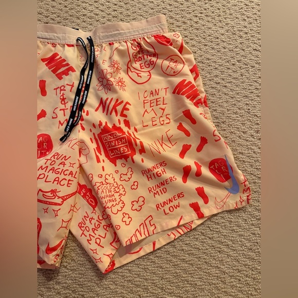 Nike Running Dri-FIT A.I.R. Nathan Bell graphic woven shorts in dusty orange - Picture 7 of 8